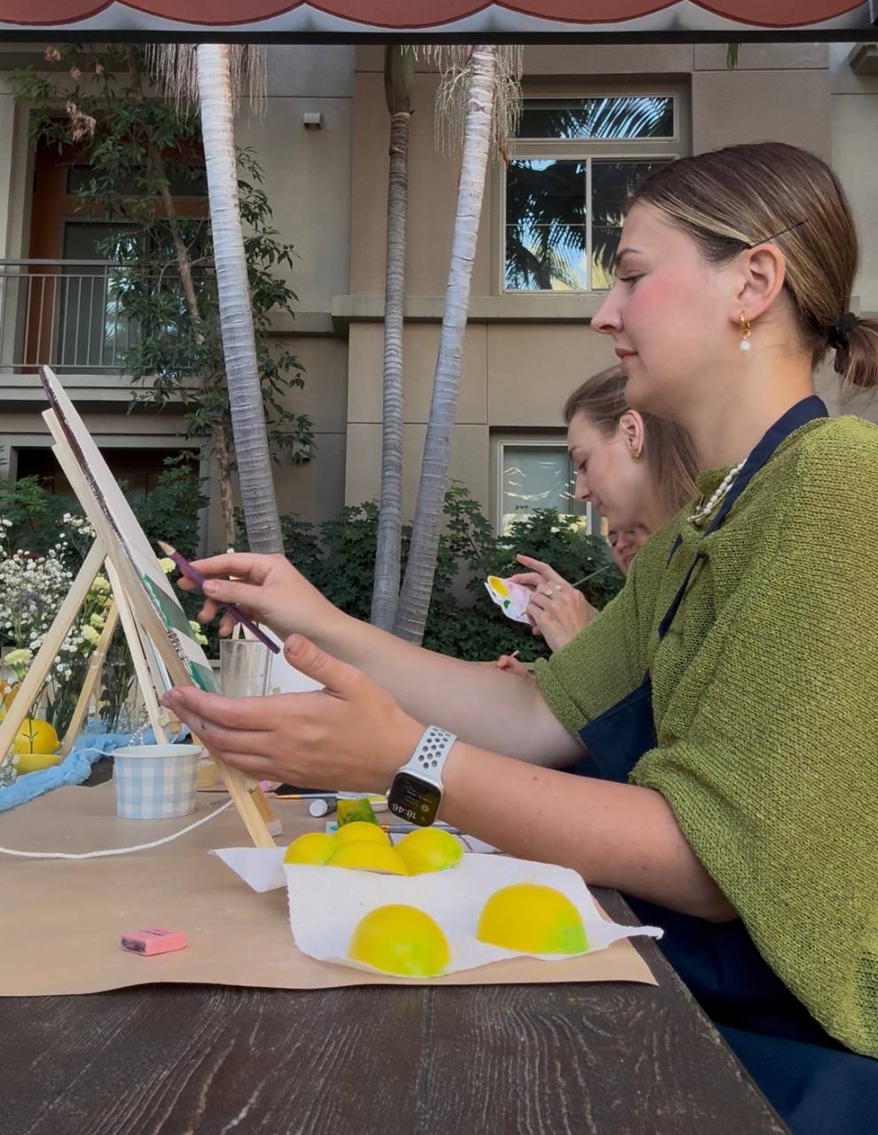 Guest painting at an easel